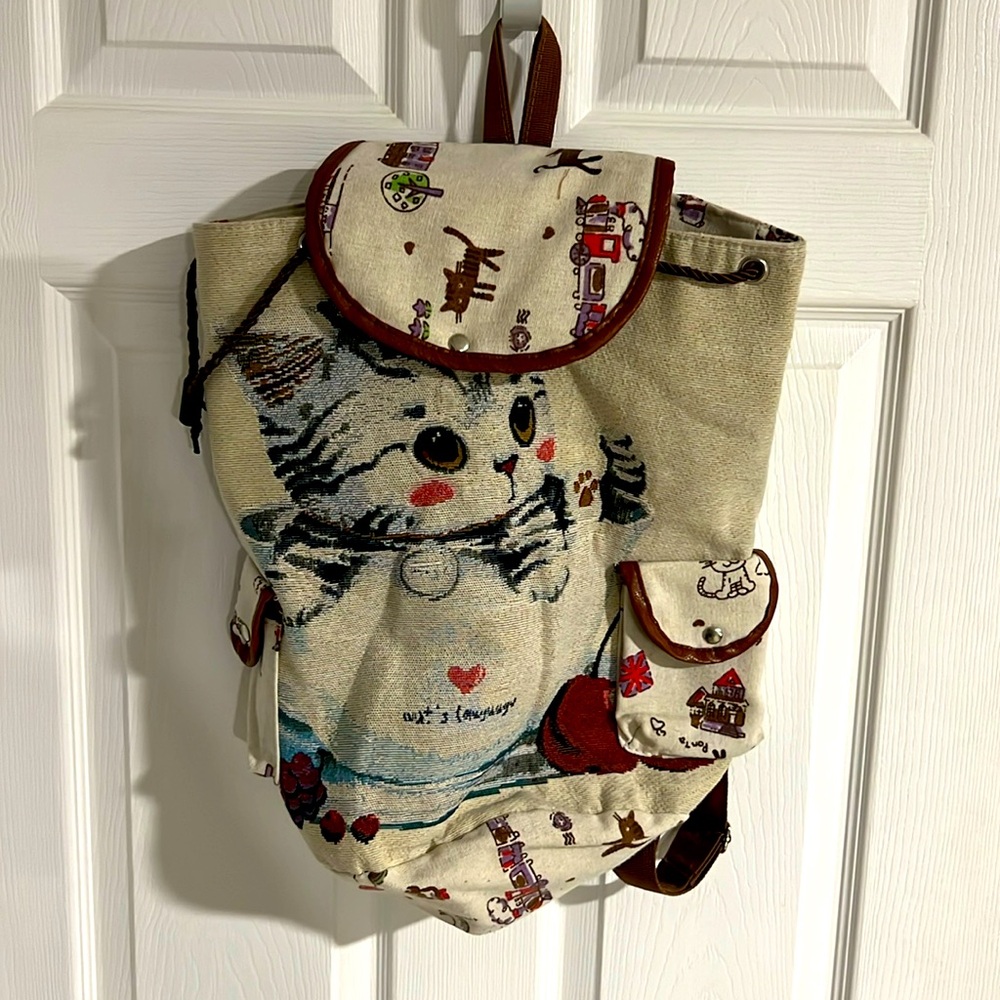 Cat magnetic clip back pack